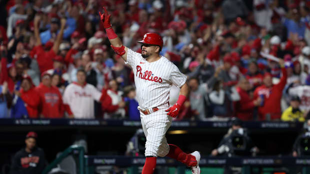 Oct 17, 2023; Philadelphia, Pennsylvania, USA; Philadelphia Phillies left fielder Kyle Schwarber (12) reacts after hitting a home run against the Arizona Diamondbacks in the sixth inning for game two of the NLCS for the 2023 MLB playoffs at Citizens Bank Park. Mandatory Credit: Bill Streicher-USA TODAY Sports